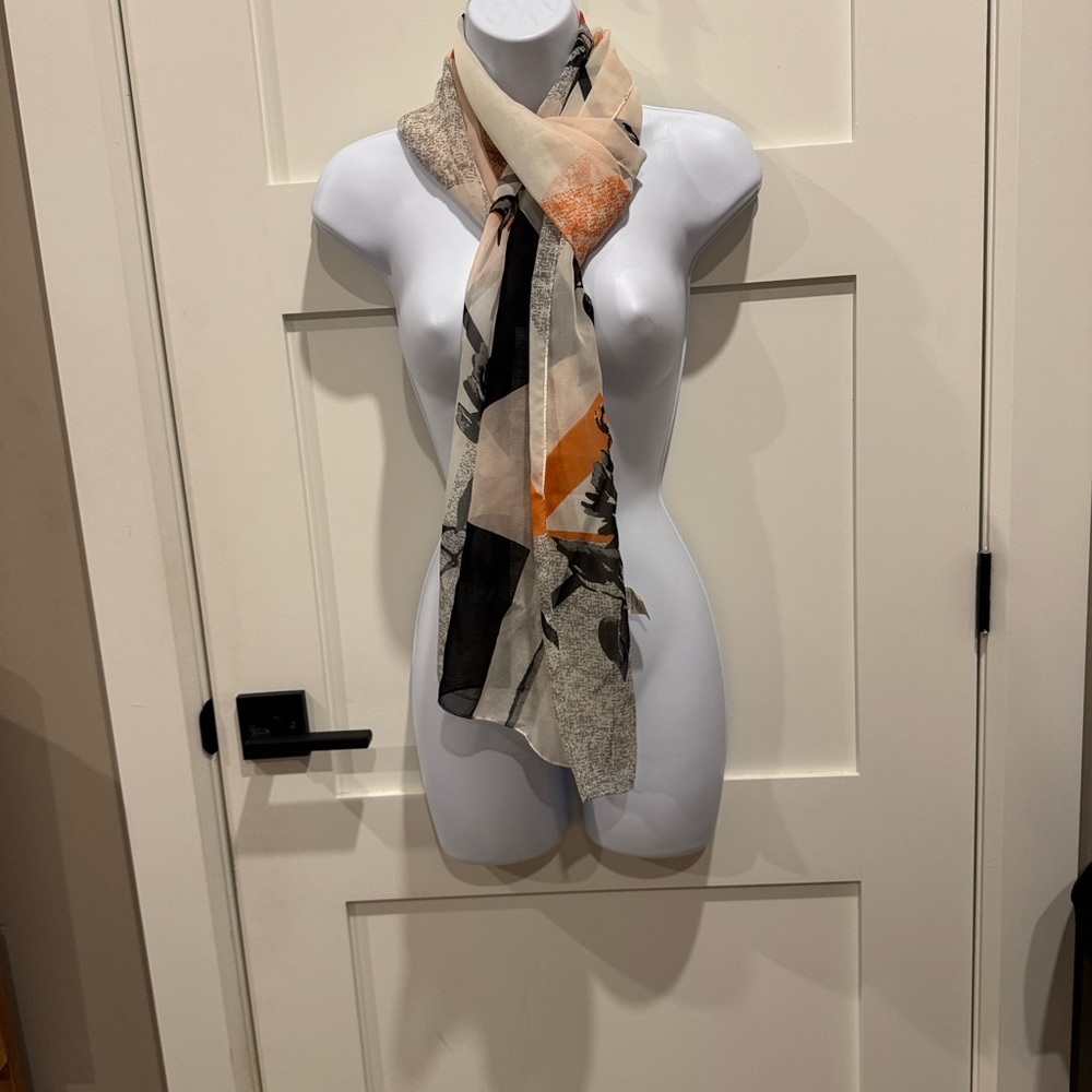 Northern Reflections Beige Scarf with Orange and Black Floral Accents